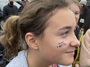 This Chippewa student shows she will not give up in the battle against cancer during the school's Terry Fox Run on Wednesday.
