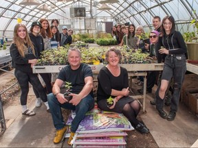 Stratford District secondary school teachers Andrew Mavor and Christine Ritsma inside the school’s greenhouse with students in Ritsma’s green industries program. SDSS is partnering with city hall next month to offer a new food education and cooking program aimed that will connect students with the wider community. (Chris Montanini/Stratford Beacon Herald)