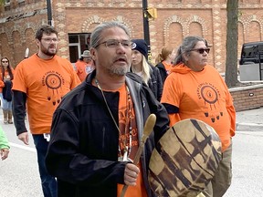 Participants are seen in downtown Wallaceburg taking part in the Healing Walk and Gathering held Thursday ahead of the National Day for Truth and Reconciliation. PHOTO Peter Epp/Postmedia