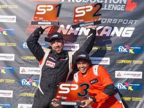 Beachburg's Nathan Blok (left) and Apex V2R teammate Suellio Almeida ham it up on the podium after they finished second and third respectively in the final race of the SPC season. S. Blok photo