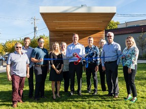 Spruce Grove City Council and City Centre Business Association members officially marked the reopening of Columbus Park with a ceremonial ribbon cutting on Monday, Sept. 26. Photo courtesy of the City of Spruce Grove.