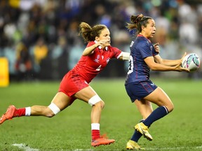 Alena Olsen, right, of the United States and Breanne Nicholas of Canada play in a women's quarter-final at the Rugby World Cup Sevens at DHL Stadium on Sept. 10, 2022, in Cape Town, South Africa. (Photo by Ashley Vlotman/Gallo Images/Getty Images)