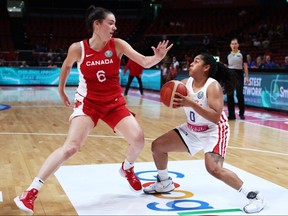 Jennifer O'Neill of Puerto Rico is challenged by Bridget Carleton of Canada during a quarter-final at the 2022 FIBA Women's Basketball World Cup at Sydney Superdome, on Sept. 29, 2022, in Sydney, Australia. (Photo by Matt King/Getty Images)