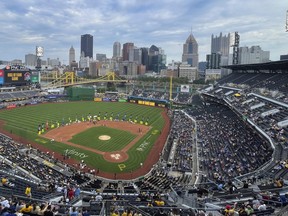 The city skyline appears over the center field wall before a baseball game between the Pirates and the Toronto Blue Jays, Saturday, Sept. 3, 2022, in Pittsburgh. THE CANADIAN PRESS/AP-Keith Srakocic