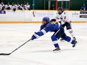 Greater Sudbury Cubs forward Cameron Walker (8) reaches for a puck during NOJHL action against the French River Rapids at Gerry McCrory Countryside Sports Complex in Sudbury, Ontario on Thursday, September 22, 2022.