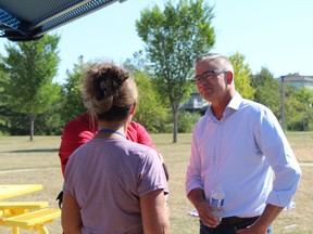 UCP leadership candidate Travis Toews talks with residents during his Fort Saskatchewan meet and greet on Sept. 2. Photo by James Bonnell.
