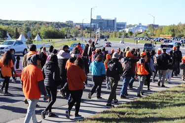 Over 350 people participated in a walk through downtown Sudbury to Bell Park to commemorate the National Day for Truth and Reconiliation.