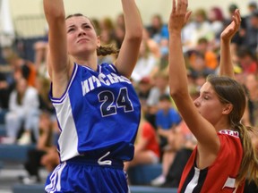 Khallee Eisler (24) of the Mitchell District high school varsity girls basketball team goes up strong to the basket during action against St. Marys as part of an eight-team senior girls tournament Sept. 16. Eisler led all scorers with 17 points in the 33-16 win. Mitchell later edged Woodstock College Ave 29-27 to earn a berth in the championship final, a 69-13 loss to Stratford St. Mike's. ANDY BADER/MITCHELL ADVOCATE