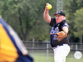 Scott Brookshaw of the Mitchell Mets delivers a pitch against the Walton Brewers during action from the 11-team Huron County Fastball League playoff tournament held in Keterson Park in Mitchell Sept. 16-18. Brookshaw pitched five consecutive games to lead the Mets to the championship final, which they lost to the Brussels Tigers. ANDY BADER/MITCHELL ADVOCATE