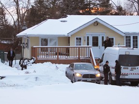 Kingston Police and Ontario Provincial Police at 966 Cottage Farms Rd. in Kingston on Feb. 14, 2019. It was the former home of Michael Wentworth and Sandra Carr.