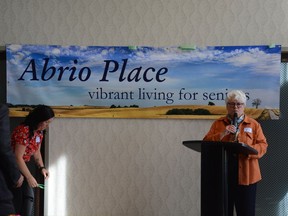 Rocky View Foundation CAO Carol Borschneck officially reveals Abrio Place as the chosen name for Airdrie's upcoming seniors lodge, being converted from the former Hampton Inn.