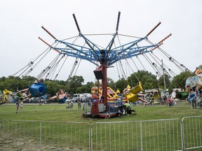 The midway came to life on Sunday and the screams could be heard throughout the fairgrounds. Due to mechanical problems, the rides were not operating on Saturday. EVELYN MCLEOD PHOTO