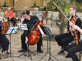 The Myriade String Quartet awed the audience at the Wellings retirement complex Thursday afternoon in Picton. From the left are: first violinist Julia Mirzoev, cellist Braden McDonnell, David Montreuil, viola and second violinist Russell Iceberg. JACK EVANS PHOTO
