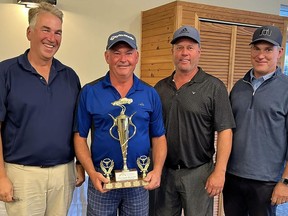Brad Whitteker's PEC Window Cleaning foursome won the Inaugural Children's Foundation Peter Smith Memorial Golf Tournament, held September 15 at Black Bear Ridge Golf Club. SUBMITTED PHOTO