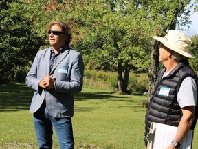 Brian Lachty, right, chair of volunteers for Picton's Macaulay Mountain Birdhouse City, introduces Brad McNevin, CAO of Quinte Conservation at a recognition gathering at the site Saturday morning.  JACK EVANS