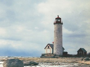 The original Point Petre Lighthouse, c.1965, before demolition by the federal government in 1970, despite local community objections. Demolitions are continuing at the Point Petre site in 2022. On the Point Petre Heritage Tour, participants will explore all the elements of the lighthouse complex – existing structures and lost structures. (Photo by Lloyd Thompson. Courtesy Queen's University Archives)
