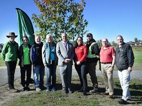 Mayor Mitch Panciuk, Councillor Chris Malette and Councillor Bill Sandison of Belleville's Green Task Force, representatives of the Quinte Field Naturalists, Belleville Home Building Centre and Tree Canada were pleased to take part in a tree planting event in Bird Park Friday morning. MARILYN WARREN PHOTO
