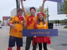 Wilfrid Laurier University - Brantford campus icebreakers, from left, Maddox Runstedler, Hao Pan and Alexi Froese welcomed students to the Grand River Hall residence Sunday during Move-In weekend.  CHRIS ABBOTT