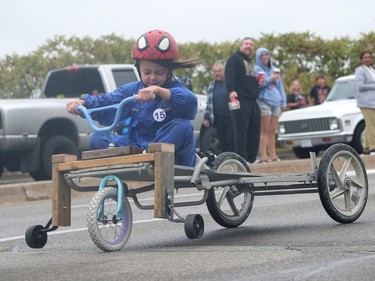 Jackson Leahy checks his wheels Monday during the Brantford and District Labour Council's annual soap box derby in Brantford. CHRIS ABBOTT