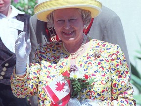 Queen Elizabeth waves to well-wishers during a visit to the Bell Homestead in 1997. Postmedia