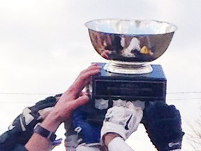 The photo shows the trophy for winning the senior high school football championship. The senior football season kicks off Thursday with a tripleheader. Expositor file photo