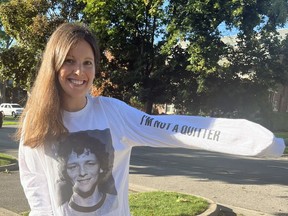 Velika Kitchen-Janzen, who has been organizing the Brantford Terry Fox Run for the past 10 years, models this year's run T-shirt. Terry Fox runs will be held in Brantford and Paris, and around the world, on Sunday.