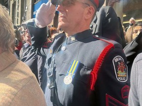 Retired Brantford police sergeant Brad Cotton received permission from Chief Rob Davis to wear his dress uniform to represent the city at the procession of the Queen's coffin in Edinburgh on Sept. 12. Cotton is a teaching fellow at the University of Edinburgh business school.