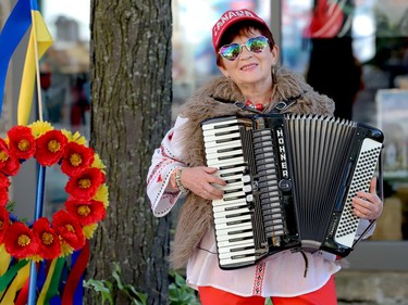 Irina Alexandrova plays the accordion on King Street West during Culture Days on Saturday morning. (RONALD ZAJAC/The Recorder and Times)