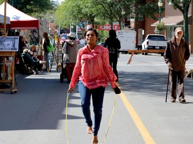 Preeta Raikar has a bit of fun skipping rope on King Street West Saturday morning during Culture Days. (RONALD ZAJAC/The Recorder and Times)