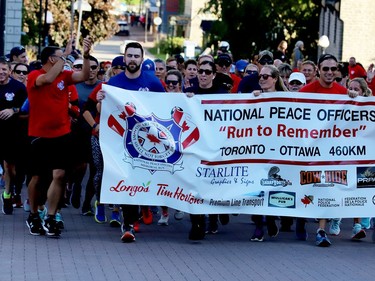 RUN TO REMEMBER
The National Peace Officers' Memorial Run, or 'Run to Remember,' makes its way up Court House Avenue in Brockville late Friday afternoon. The runners stopped in Brockville for the night before resuming their journey to the Peace Officers' Memorial Service on Parliament Hill on Sunday. Friday's was the first full run since 2019, now that COVID-19 restrictions are lifted. (RONALD ZAJAC/The Recorder and Times)