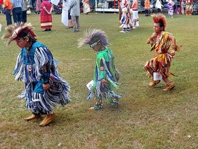 These youngsters display their dancing talent during the Grand Entry to the Delaware Nation of the Thames 50th annual Powwow, on Sunday.  PHOTO Ellwood Shreve/Chatham Daily News