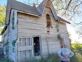 Peter Anderson looks over the west side of the Guyitt House, purchased by his grandparents Roy and Ethel Guyitt in 1908. (Ellwood Shreve/Postmedia Network)