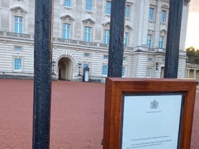 Bulletin announcing Queen Elizabeth II's death on Sept. 8 at Buckingham Palace. Tyler Yates