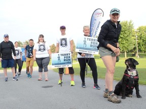 Cornwall Terry Fox Run volunteer Tanya Deeks (right) and her dog Otter lead other volunteers on a short walk at the Run. Pictured on Sunday September 18, 2022 in Cornwall, Ont. Greg Peerenboom/Special to the Cornwall Standard-Freeholder/Postmedia Network