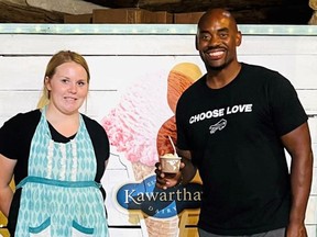From left, Becky MacIntosh of Ole Sugar Barn Ice Cream Shop recently served former NHL linebacker Chris Draft. The business was granted just under $10k in funding on Tuesday, Sept. 20 for improvements through SDG's Regional Incentives Program. Handout/Cornwall Standard-Freeholder/Postmedia Network