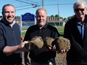 From left, cenotaph committee chairperson SDSG MP Eric Duncan, local GFL branch representative Brian Kronstal, and South Dundas Mayor Steven Byvelds, did their share by picking up a couple of small boulders as part of the new Iroquois Cenotaph construction launch. Pictured on Saturday September 24, 2022 in Iroquois, Ont. Greg Peerenboom/Special to the Cornwall Standard-Freeholder/Postmedia Network