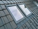 Closeup of attic window on house roof top covered with ceramic shingles. Handout/Cornwall Standard-Freeholder/Postmedia Network