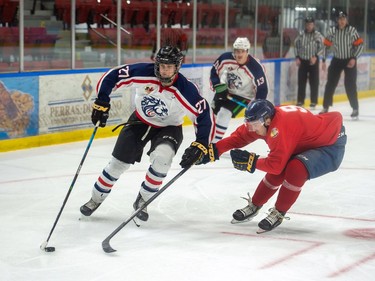 The Brockville Braves Alex Rossides takes a stab at poking the puck from Cornwall Colts Hunter Brennan during exhibition play on Saturday September 3, 2022 in Cornwall, Ont. Cornwall won 3-0. Robert Lefebvre/Special to the Cornwall Standard-Freeholder/Postmedia Network