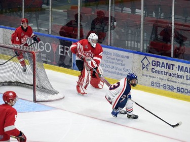 Cornwall Colts Ethan Henry goes chasing the puck cleared by Pembroke Lumber Kings goaltender Ben Forget on Sunday September 11, 2022 in Cornwall, Ont. Cornwall lost 4-1. Robert Lefebvre/Special to the Cornwall Standard-Freeholder/Postmedia Network