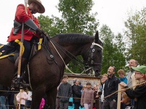 An RCMP rider and horse greet spectators following the RCMP Musical Ride performance at Upper Canada Village, on Sunday September 4, 2022 in Morrisburg, Ont. Greg Peerenboom/Special to the Cornwall Standard-Freeholder/Postmedia Network