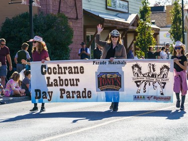 Tony's Western Wear leads at the labour day parade in Cochrane on Monday, Sept. 5, 2022.