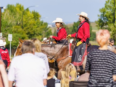 People on horseback at the labour day parade in Cochrane on Monday, Sept. 5, 2022.