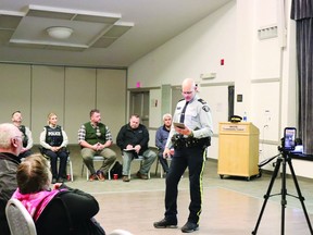 Sergeant Christopher Mosley speaks at the Devon RCMP's bi-annual town hall meeting at the Devon Community Centre, Sept. 22. (Supplied by Town of Devon)
