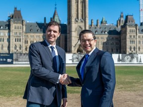 Member of Parliament for Battle River--Crowfoot, Damien C. Kurek, right, congratulates Hon. Pierre Poilievre for his election as the new leader of the Conservative Party of Canada. Kurek photo