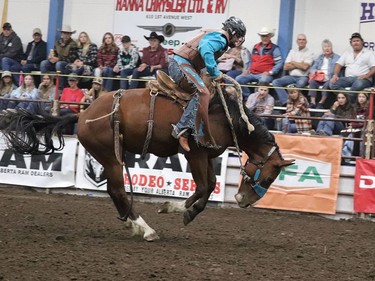 The dust was flying at the Hanna Indoor Pro Rodeo at the Hanna Arena in Hanna, Alta. on Sept. 17 as cowboys and cowgirls from all over the world descended for the first day of rodeo. The event was well attended by spectators and participants alike. Jackie Irwin/Postmedia