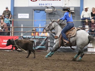 Kendal Pierson took part in the new Ladies Roping event at the Hanna Indoor Pro Rodeo at the Hanna Arena in Hanna, Alta. on Sept. 17 as cowboys and cowgirls from all over the world descended for the first day of rodeo. The event was well attended by spectators and participants alike. Jackie Irwin/Postmedia