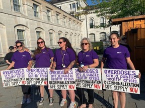 Jennifer Griffith, Jayme Hayward, Justine McIsaac, Sue Deuchars and Amber Lagroix at the International Overdose Awareness Day event at Springer Market Square on Wednesday.