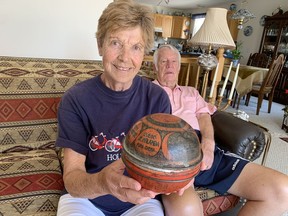 Hennie Vanderveer on Thursday holds a 78-year-old tin of cheese that was part of an Allied food drop in the Netherlands near the end of the Second World War.