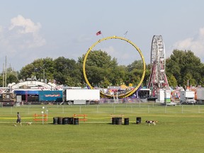 The grounds at the Memorial Centre being set up for the 190th Kingston Fall fair, seen here in Kingston, Ont., on Wednesday, Sept. 14, 2022. The four-day fair, starting Thursday, showcases a variety of livestock and 4-H achievements, along with featuring midway rides, a demolition derby, a country singing competition, home craft competitions and more. Julia McKay/The Kingston Whig-Standard/Postmedia Network