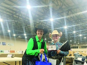 Leduc county youth Tavia Tolsma poses with her hardware after capturing the Alberta Barrel Racing Peewee championship. (Supplied)